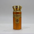 Mystiq Wild Tobacco perfume bottle with gold cap on a white surface