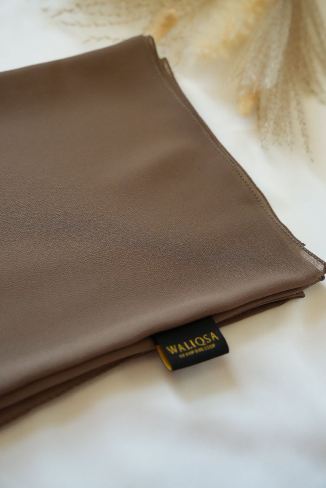 Wild Stone hijab from Waliqsa in lightweight bubble chiffon – soft, breathable, and ready to wear.